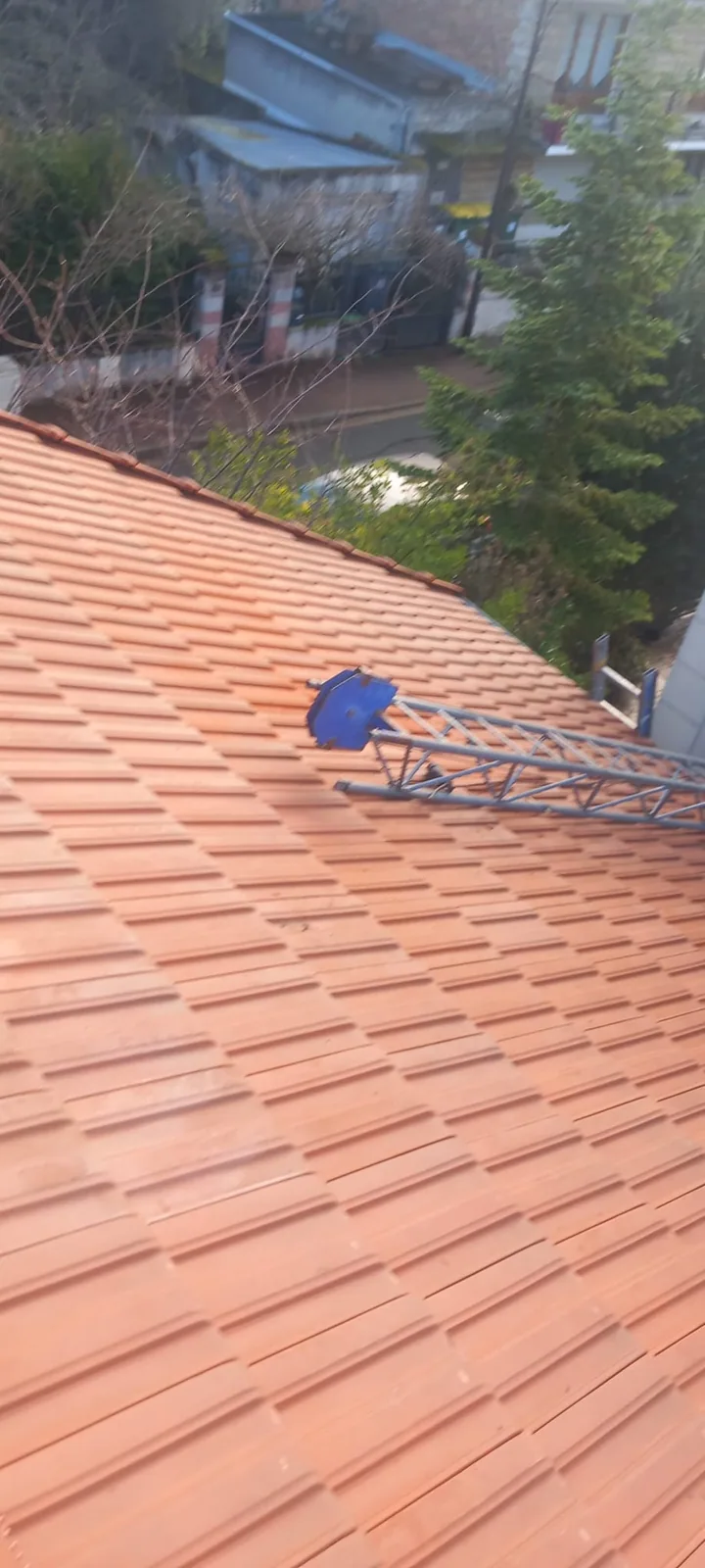 Nos zingueurs en intervention sur un immeuble gentilléen